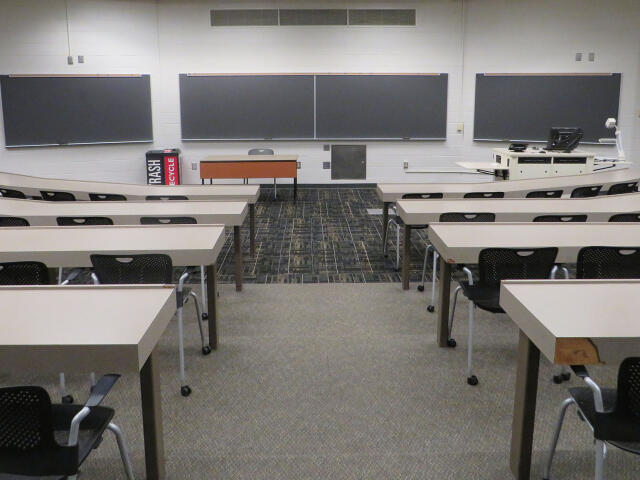 empty classroom seen from back of the room